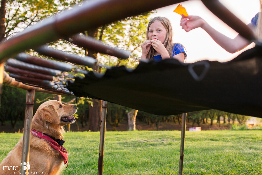 Children's lifestyle photography - girls and dog