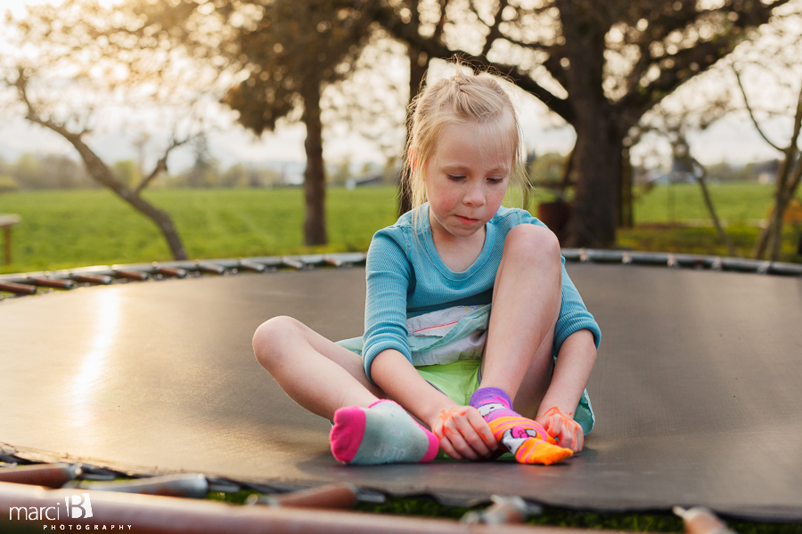 Trampoline fun - child - mismatched socks