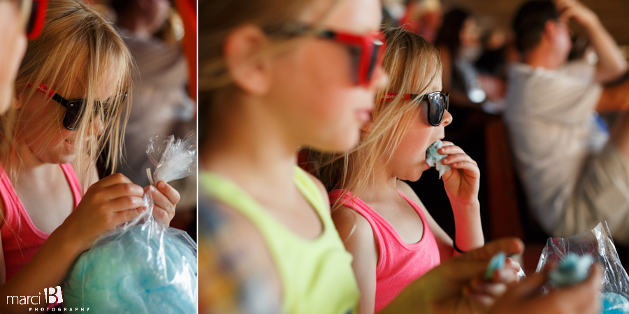 girl eating cotton candy