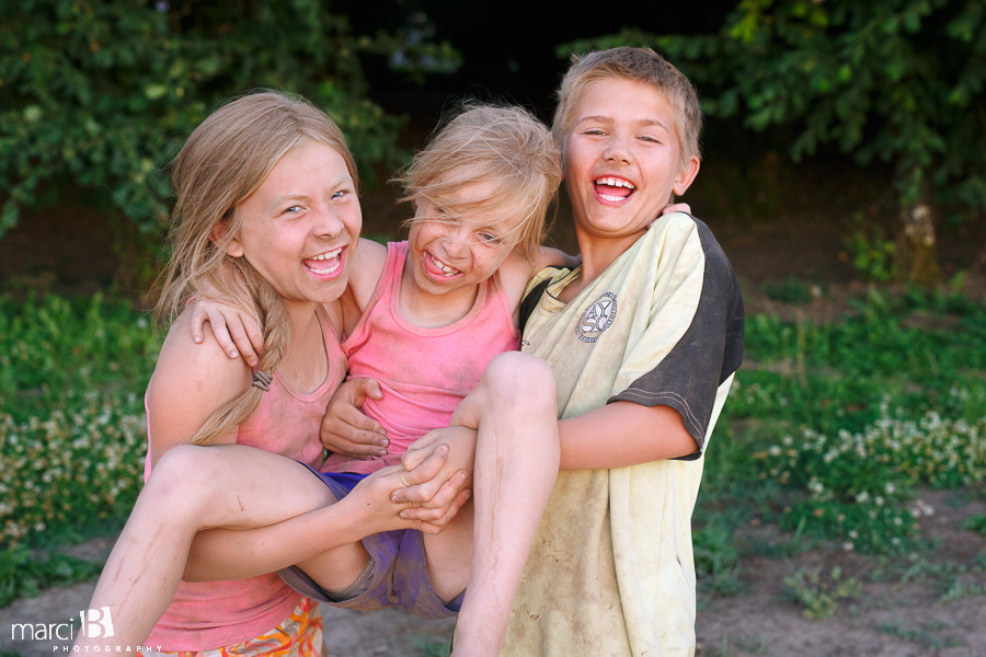 kids playing at sunset - kids on the farm - country life