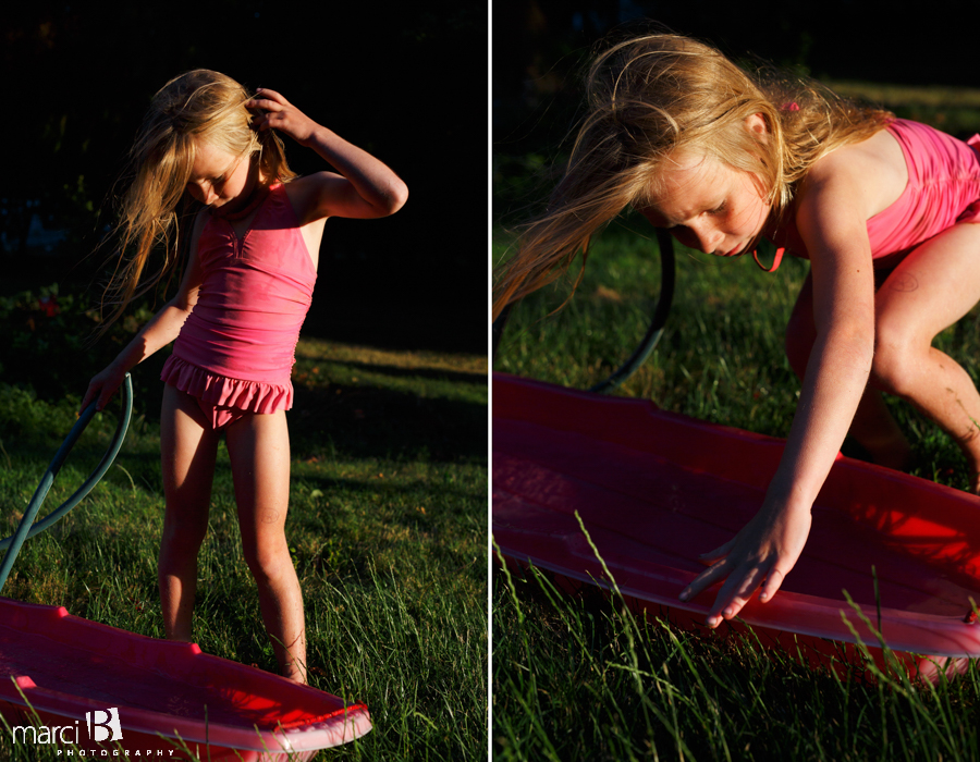 girl playing with water 