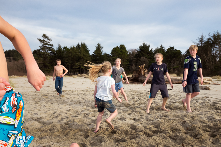 Oregon coast - kids at the beach - kids playing tag